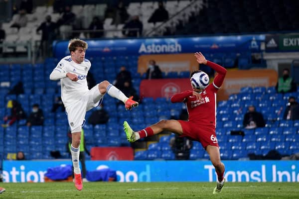 Leeds United's Patrick Bamford (left) denounced the proposed European Super League after his side's draw against Liverpool, one of the proposed member of the break-away league. He is pictured competing against out-of-sorts right-back Trent Alexander-Arnold.