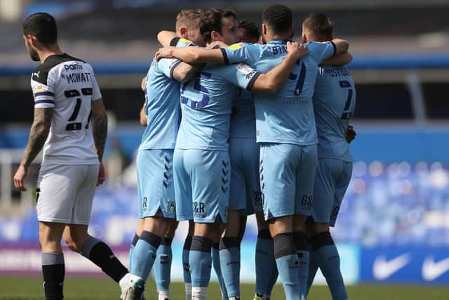 Coventry City players celebrate after Dominic Hyam (hidden) openign goal against Barnsley on Sunday (Picture: PA)