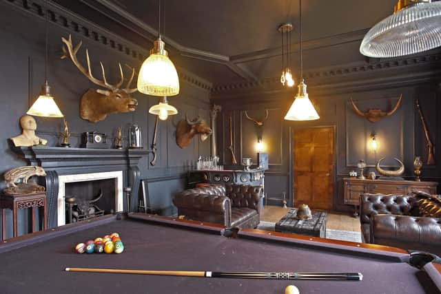 The dramatic colour scheme of the games room at Morthen Hall near Wickersley, Rotherham, is reflected throughout the restored nine-bedroom Grade II mansion, which comes with 1.2 acres of land, £1.7m. Contact: fineandcountry.com