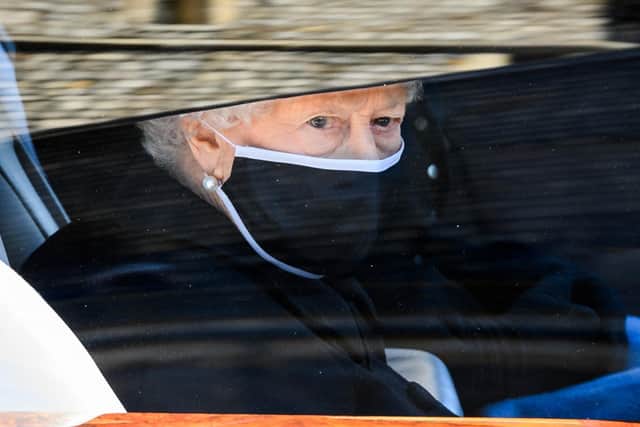 The Queen travelling in a State Bentley to Prince Philip's funeral on Saturday.