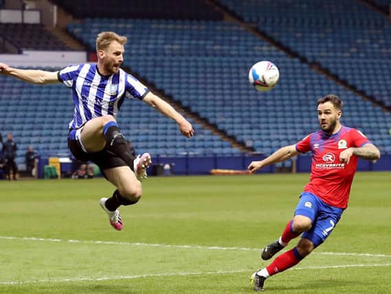 Tom Lees showed his acrobatic skills in Sheffield Wednesday's home game with Blackburn. Picture: PA.