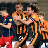 RRescue act: Hull City’s Josh Magennis, left, celebrates scoring their side’s equaliser against Sunderland in the League One match at the KCOM Stadium. (Picture: Mike Egerton/PA)
