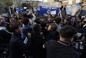 Victory: Chelsea fans celebrate after hearing the news that their club had withdrawn from the ESL. Picture: AP