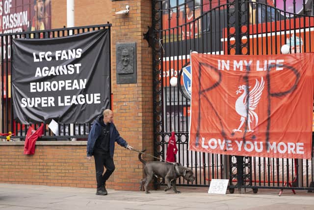 Banners are seen outside Liverpool's Anfield Stadium after the collapse of English involvement in the proposed European Super League. (AP Photo/Jon Super)