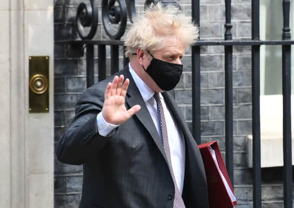 Prime Minister Boris Johnson leaves 10 Downing Street to attend Prime Minister's Questions at the Houses of Parliament in London. Picture: Stefan Rousseau/PA Wire