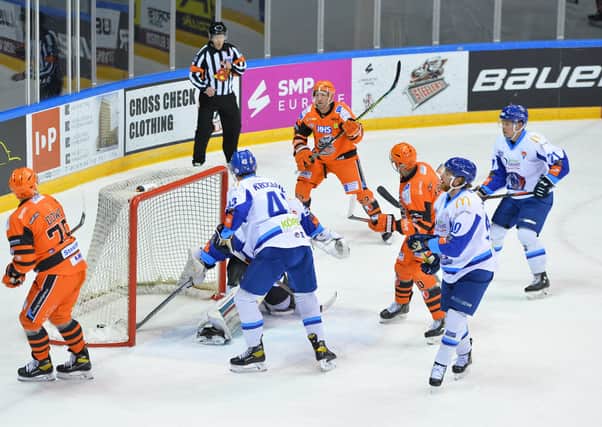 FINDING HIS RANGE: Brendan Connolly scores the first of his two goals in Tuesday night's win over Coventry Blaze, who Sheffield Steelers face again on Thursday evening. Picture courtesy of Dean Woolley.