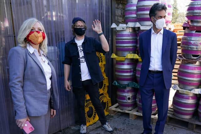 Luke Raven of Ilkley Brewery with Ed Miliband and Tracy Brabin. Pic: Getty Images