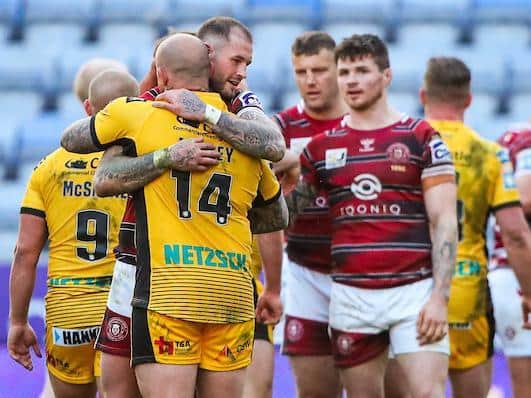Mutual respect between Tigers' Nathan Massey and former teammate Zak Hardaker at full-time. Picture by Alex Whitehead/SWpix.com.