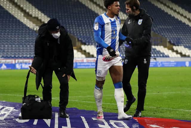 SETBACK: Josh Koroma leaving the field after injuring his hamstring against Sheffield Wednesday in December. He is now back to fitness