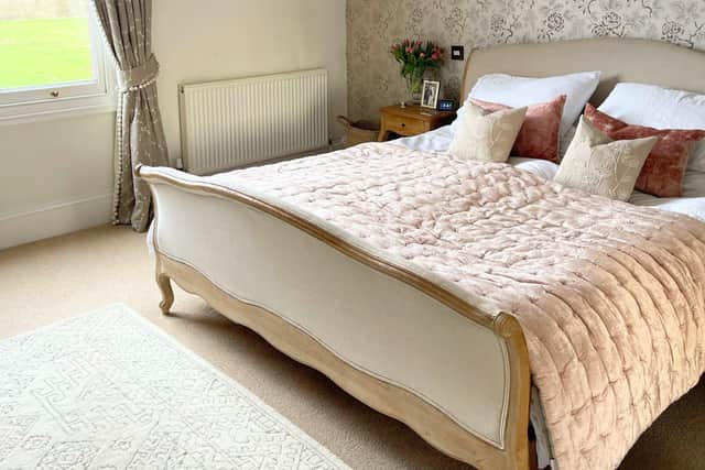 Melissa Abbott's home near Ripon - The master bedroom features calming tones of soft pink and creams.