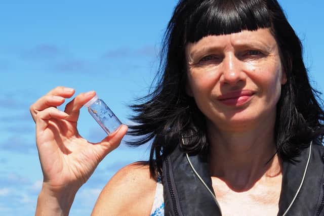 Fashion Revolution Co-founder Carry Somers with a water sample. Photo: Fashion Revolution