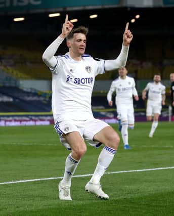 Leeds United's Diego Llorente celebrates scoring their side's first goal of the game during the Premier League match at Elland Road, Leeds. Picture date: Monday April 19, 2021. PA Photo. See PA story SOCCER Leeds. Photo credit should read: Lee Smith/PA Wire.

RESTRICTIONS: EDITORIAL USE ONLY No use with unauthorised audio, video, data, fixture lists, club/league logos or "live" services. Online in-match use limited to 120 images, no video emulation. No use in betting, games or single club/league/player publications.