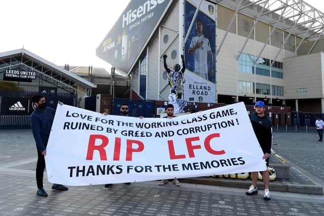 Fans gather to protest against the European Super League outside Elland Road on Monday. Picture by Simon Hulme