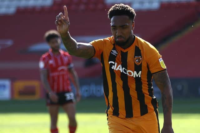 Spot on: Hull City's Malik Wilks celebrates scoring their side's second goal of the game from a penalty.