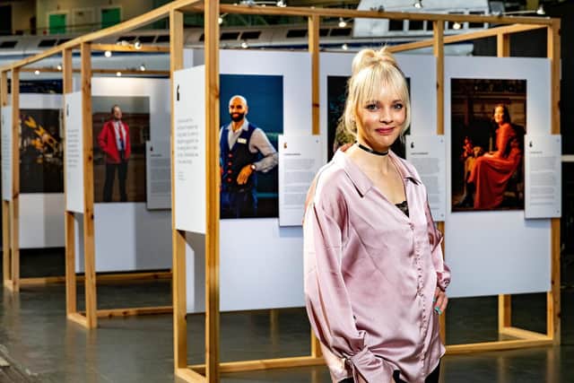 Pictured, Penny Bond MBE with the new exhibition, which her portrait features in. The National Railway museum is currently preparing for opening with the 'Railway Heroes' exhibition. Photo credit: Charlotte Graham
