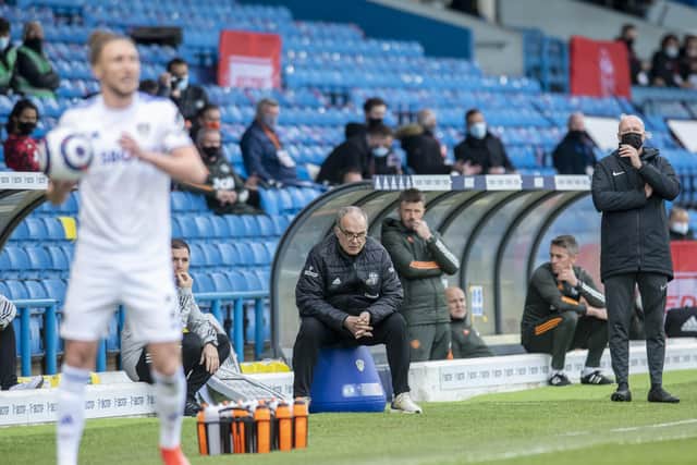 IMPRESSED: Marcelo Bielsa watches intently from his bucket as Luke Ayling prepares to take a throw-in