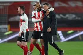 All smiles: Sheffield United goalscorer David McGoldrick and interim manager Paul Heckingbottom at the end of the 1-0 win over Brighton and Hove Albion at Bramall Lane. Picture: Simon bellis/Sportimage