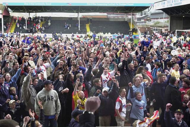 Rotherham United fans celebrate their side's promotion to the first division.