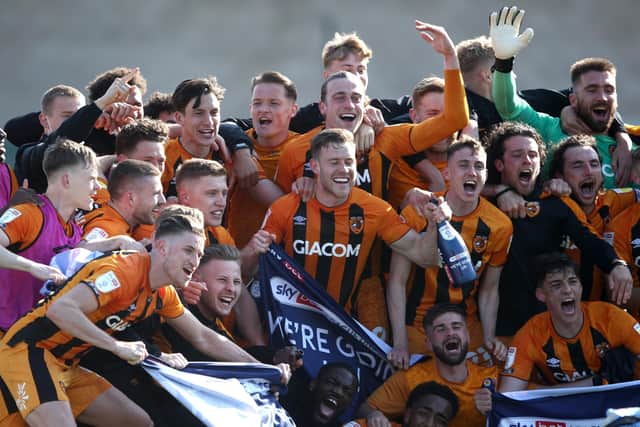 Hull City players celebrate promotion to the Championship. Picture: PA.