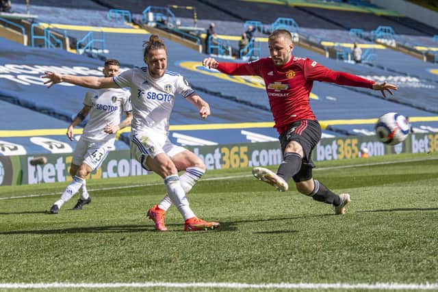 Leeds United's Luke Ayling gets to the byline as Manchester United's Luke Shaw closes in. Picture: Tony Johnson