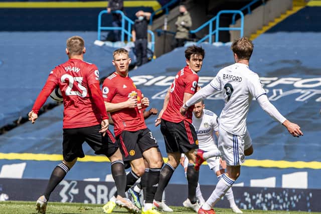 Close call: Leeds United winger 
Jack Harrison's cross appears to hit Luke Shaw's upper arm in the visiting penalty area but VAR came to the full-back's rescue.  Picture Tony Johnson