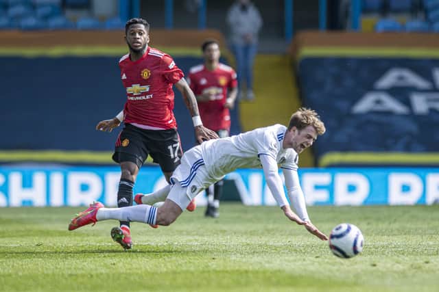 Takign a tumble: 
Leeds United's Patrick Bamford is tripped by  Manchester United's Fred.  Picture Tony Johnson