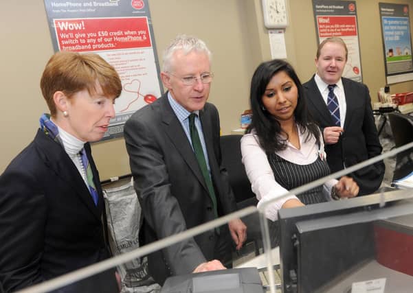 Paula Vennells (left) during a visit to a local post office in 2012.