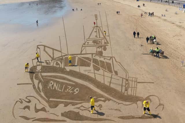 Sand art at Scarborough Beach depicts RNLI lifeboat as charity issues plea for help from the public ahead of anticipated rise in calls this summer