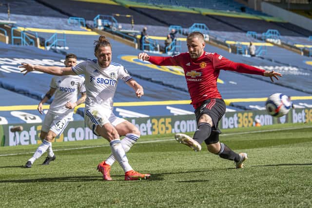 Luke Ayling gets to the byline asMan United's Luke Shaw closes in. (Picture: Tony Johnson)