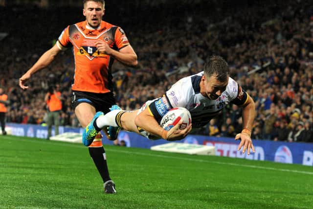 Top scorer: Danny McGuire dives in for the Rhinos second try in the 
Super League Grand Final 2017 - one of 247 he scored in his storied career. Picture Bruce Rollinson