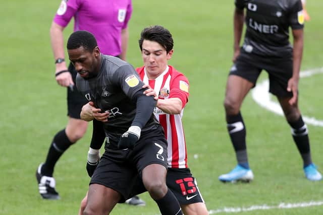 Omar Bogle, left, could be back for Doncaster Rovers (Picture: PA)