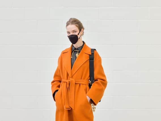 Natalia Vodianova wears the Masuku One face mask which also comes in black.