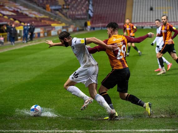 Action from Bradford City's home game with Salford City at a wet Valley Parade. Picture: Bruce Rollinson.