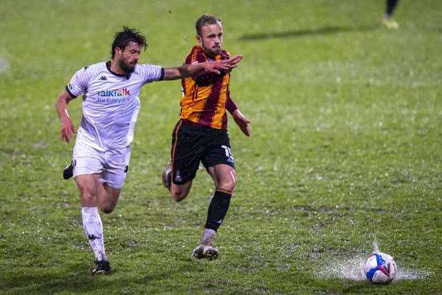 Jason Lowe and Charles Vernam chase the ball.   Picture Bruce Rollinson