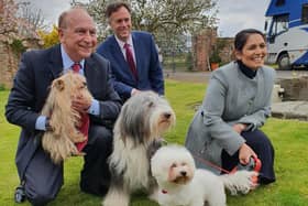 Home Secretary Priti Patel (right) on a visit to a kennels in York today. She was there in support of PCC candidate Philip Allot (left) and was joined by York MP Julian Sturdy (centre)