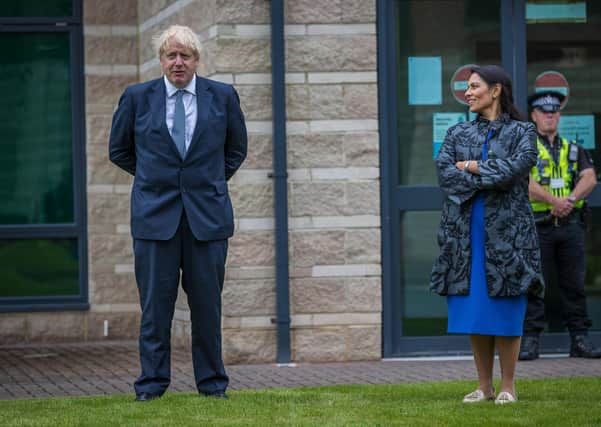 Boris Johnson and Priti Patel during a visit to North Yorkshire Police last summer. Photo: ©2020 CAG Photography Ltd.