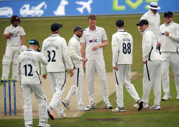 Success: Yorkshire captain Steve Patterson is congratulated for the dismissal of Ben Curran. Picture: Dave Williams