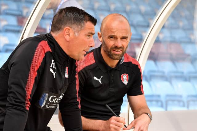 Rotherham United manager Paul Warne (right) and assistant manager Richie Barker in the dugout.
