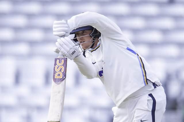 Yorkshire's Dom Bess hits out against Northamptonshire.
