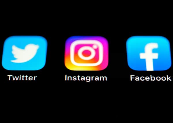 Boycott: Twitter, Instagram and Facebook Apps on an Iphone screen.   Many sports are boycotting social media this weekend in a unified stand against racism and discrimination.