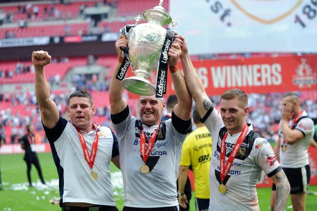 WINNERS: Lee Radford, left, Gareth Ellis and Marc Sneyd celebrate beating Warrington Wolves to win the Challenge Cup at Wembley in  August 2016. 
Picture: Jonathan Gawthorpe