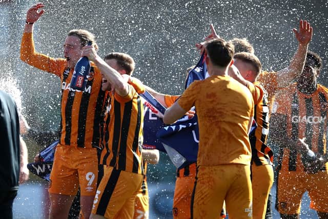 Hull City players celebrate promotion to the Championship (Picture: PA)