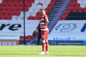 Doncaster's Andy Butler cuts a lonely figure after the defeat by Fleetwood. Picture: Howard Roe/AHPIX LTD