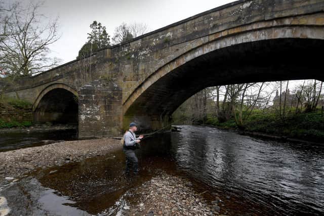Oscar Boatfield pictured fly-fishing on the River Nidd, Pateley Bridge