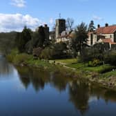 St Nicholas Church and The Marmion Tower stand on the banks of the River Ure, in the village of West Tanfield, near Ripon. Picture: Jonathan Gawthorpe