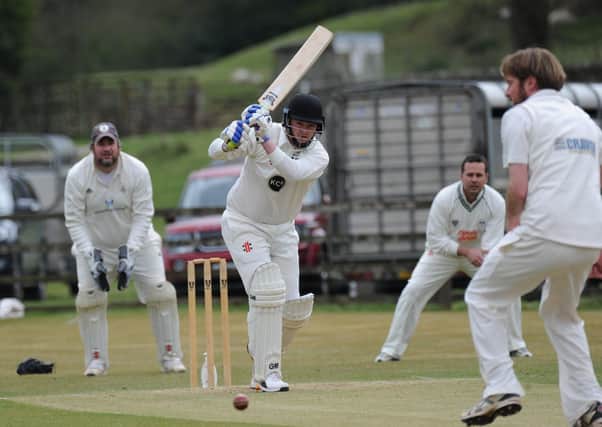 On the drive: Lewis Foxton helping Pateley
 Bridge to 248 in the 61-run Nidderdale League win at home to Goldsborough. Picture: Gerard Binks