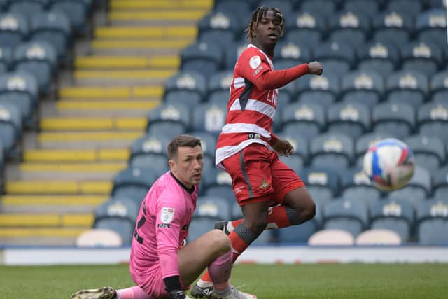 On target: 
Doncaster's Taylor Richards watches his shot go into the net. Picture: Howard Roe.