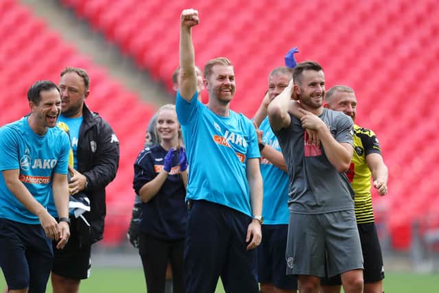 DO YOU REMEMBER THE FIRST TIME? Harrogate Town boss Simon Weaver celebrates after his team' victory in the National League Play Off Final against Notts County at Wembley in August. Picture: Catherine Ivill/Getty Images.