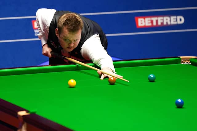 Shaun Murphy plays a shot during the first day of the World Snooker Championship final against Mark Selby at The Crucible, Sheffield. Picture: Zac Goodwin/PA