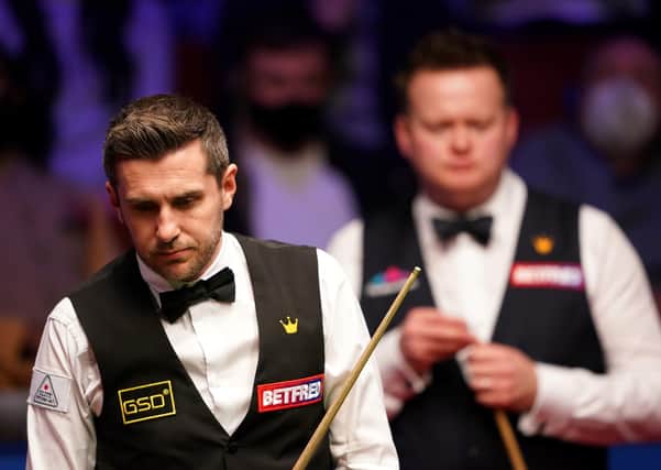 HARD SLOG: Mark Selby considers nis next shot at The Crucible, Sheffield. Picture: Zac Goodwin/PA